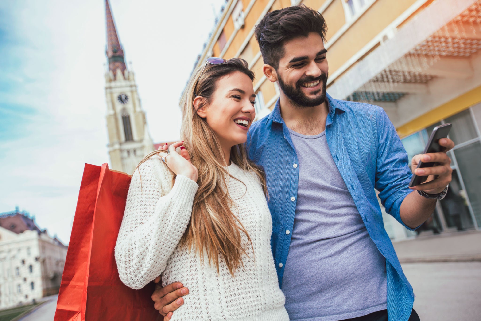Image showing the couple shopping with their phone